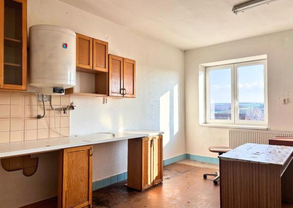 INVESTIČNÁ PRÍLEŽITOSŤ – Murovaná budova s možnosťou prestavby na bytový dom