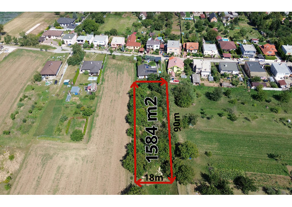 Na predaj veľký stavebný pozemok pre 1–4 rodinné domy – Veľké Zálužie 